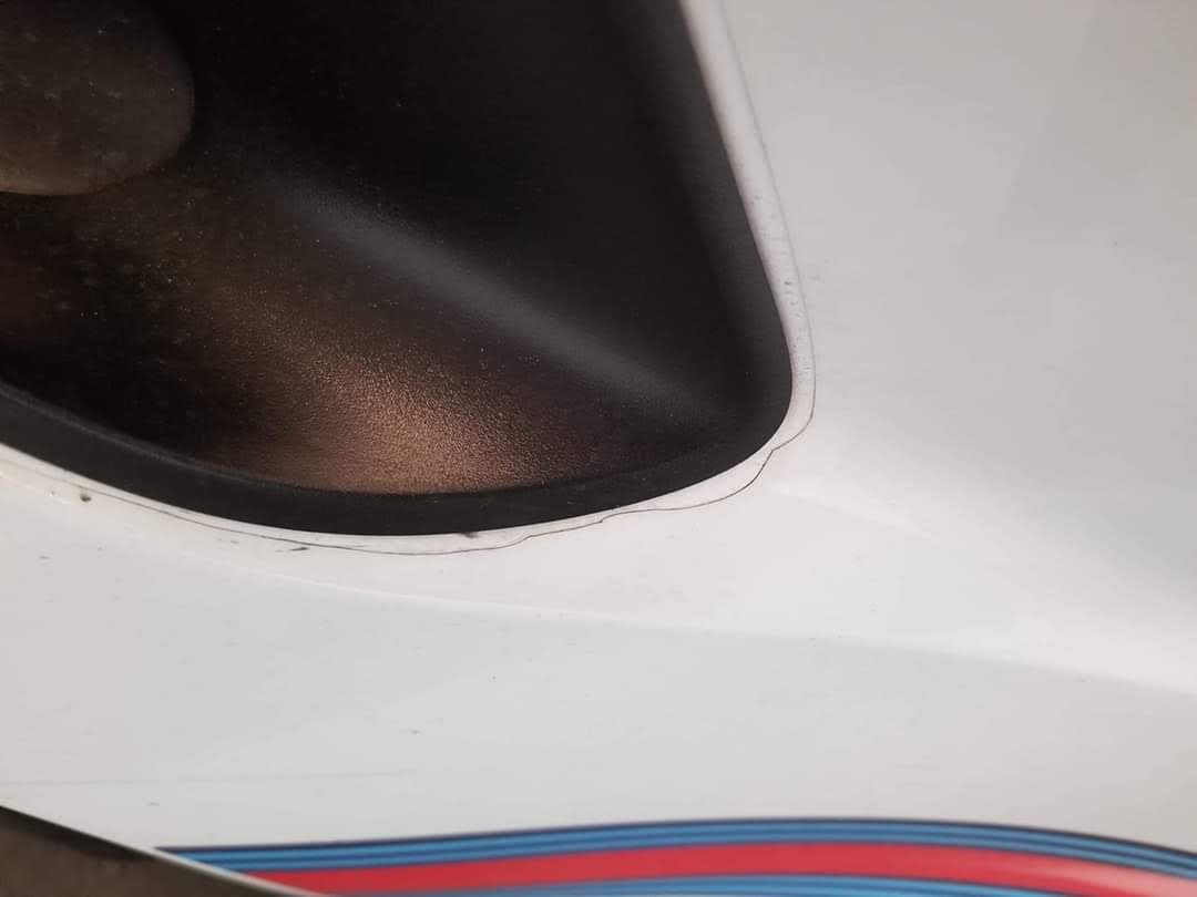 bad ppf installation on white car