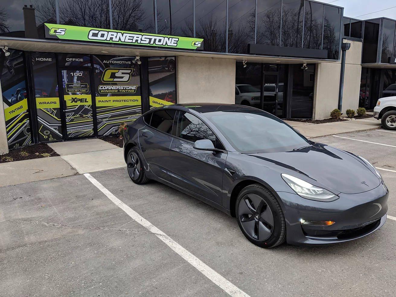 black tesla with window tint