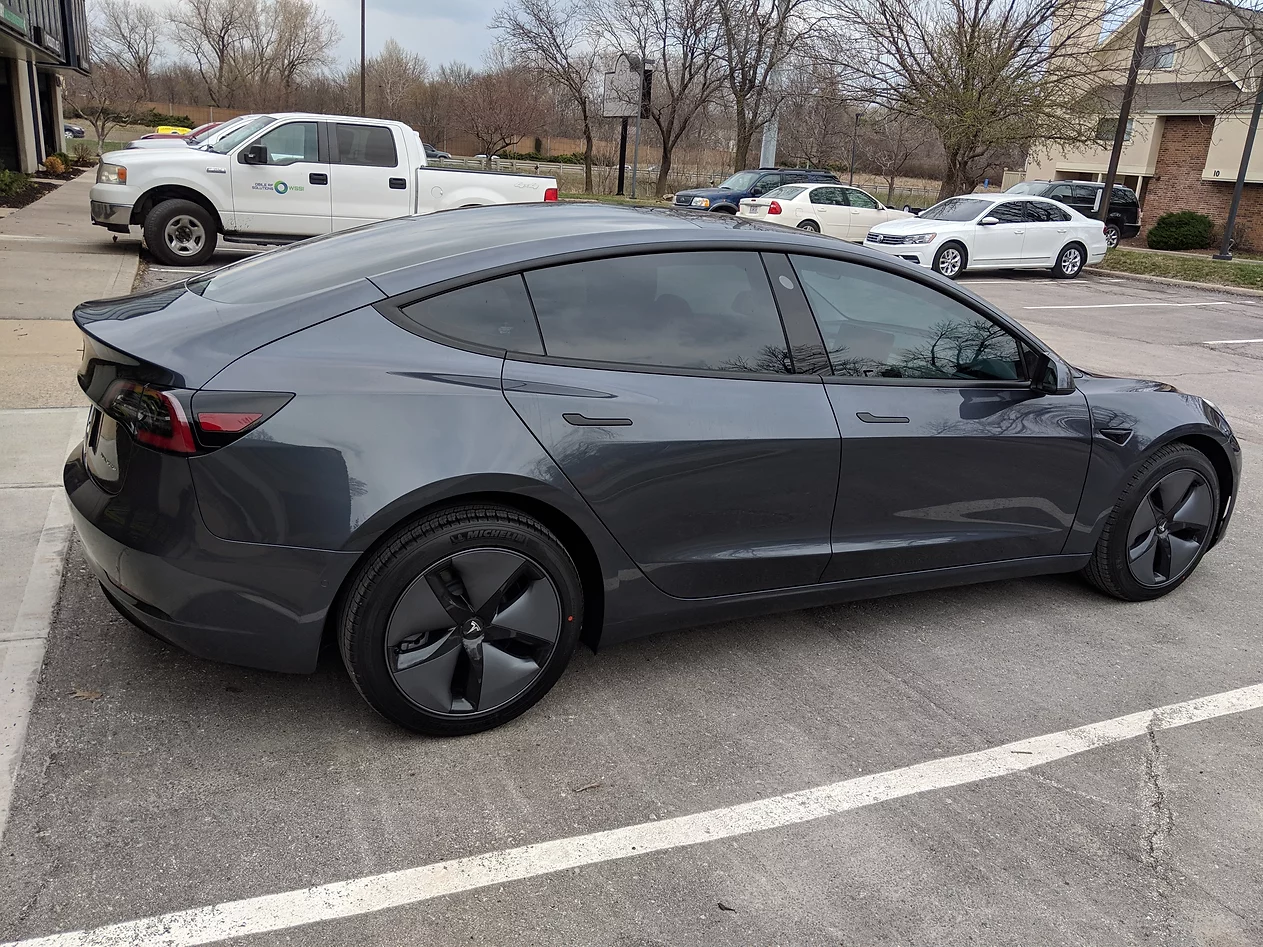 black tesla with tinted windows